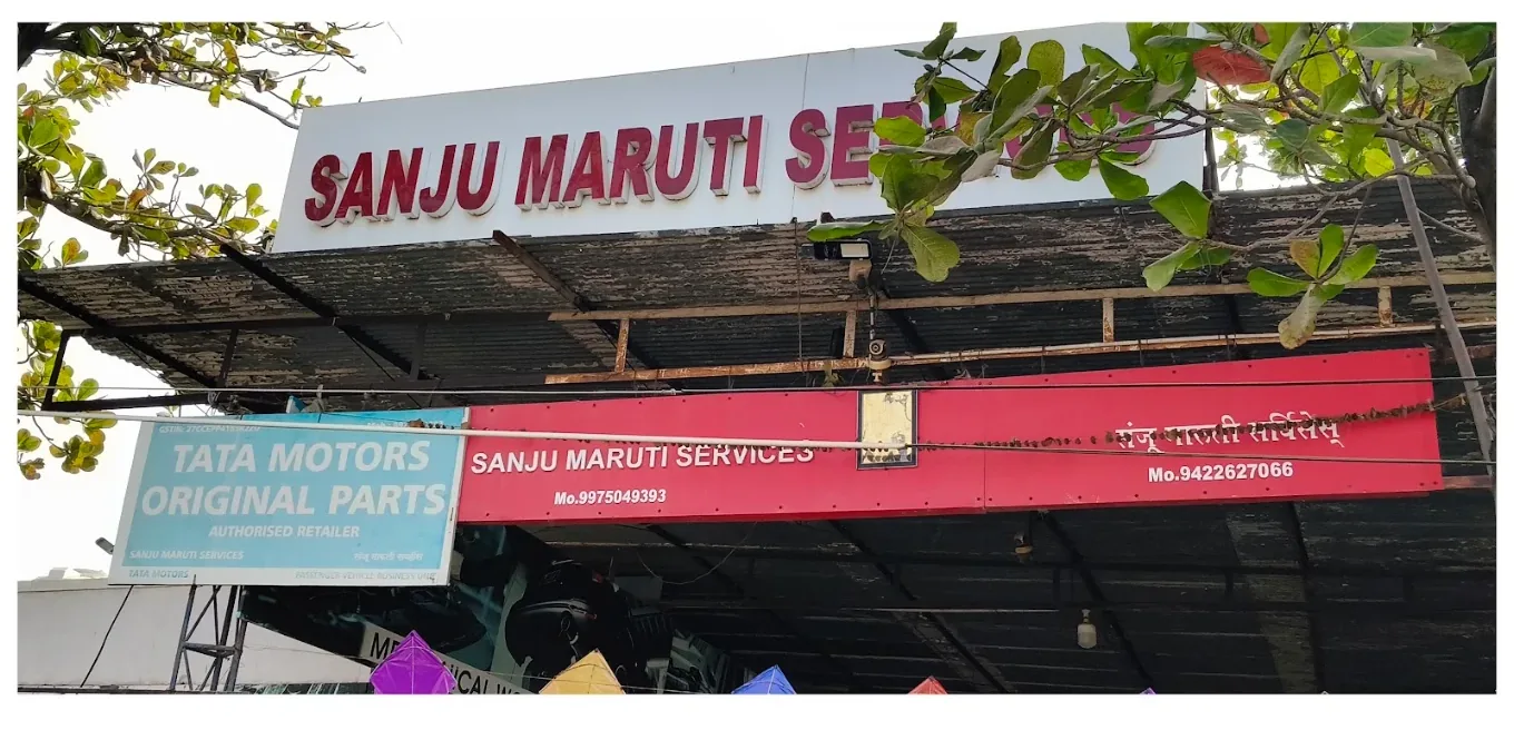 Sanju Maruti Services signboard with Tata Motors original parts board